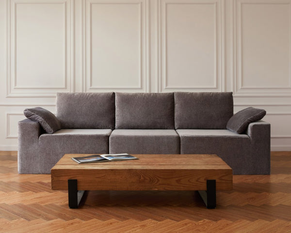 Lifestyle image of Diorama’s Modular Washable 3-Seater Cloud + Bolster Sofa in Heirloom Velvet Truffle, highlighting the sister brand Diorama.