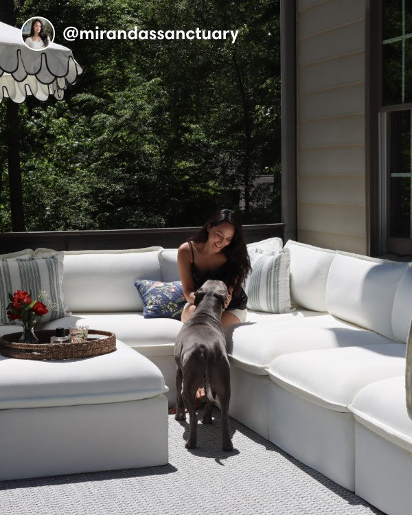 Lifestyle image of a Modular Outdoor Washable 6-Seater Open-Ends U-Sectional with Ottoman in Classic Canvas Cloud, shown in a real customer outdoor setting.