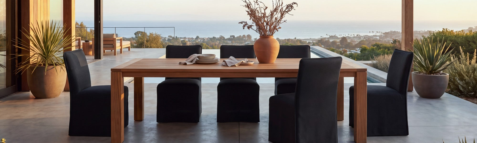Lifestyle banner image of a dining table surrounded by washable dining chairs in Charcoal fabric styled in a real home setting, highlighting a 30-day risk-free trial.