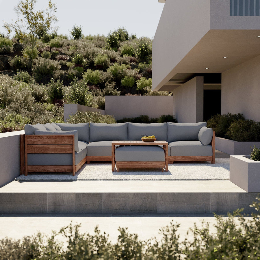 Dwell™ Modular Teak Outdoor 5-Seater L-Sectional with Ottoman + Side Table | Classic Canvas in Stone Gray