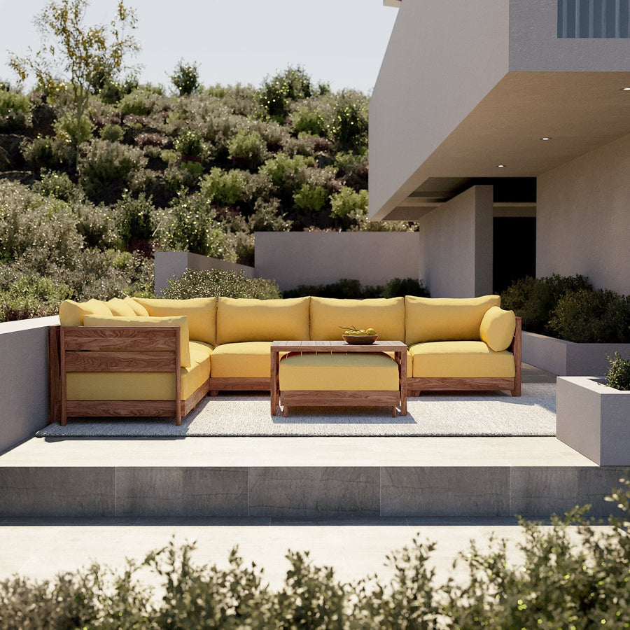 Dwell™ Modular Teak Outdoor 5-Seater L-Sectional with Ottoman + Side Table | Classic Canvas in Sun